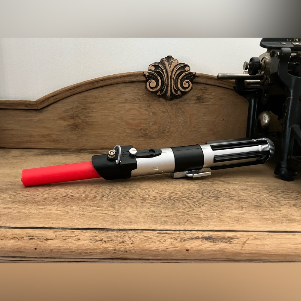 Star Wars toy light saber red